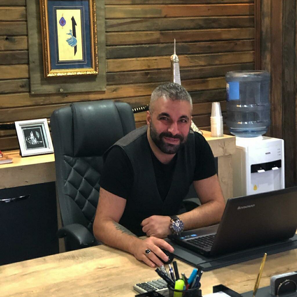 Rıdvan Şengül at his desk